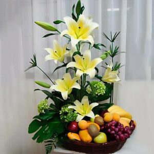 Tropical Fruit & Lily Gift Basket — Cabo Delivery flowers in Cabo San Lucas